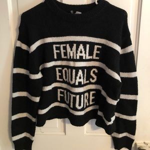 “future equals female” sweater